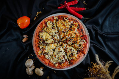 High angle view of pizza on table