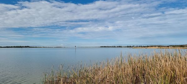 Scenic view of lake against sky
