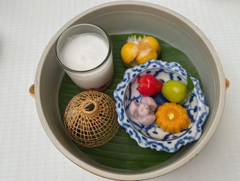 High angle view of afternoon tea snacks on table