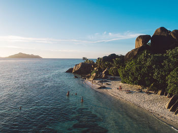 Scenic view of sea against blue sky