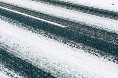 Full frame shot of snow on road