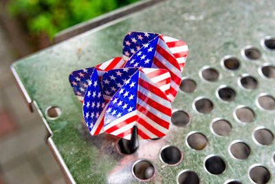 Close-up of flags against blurred background