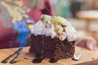 Chocolate brownie cake and whipped cream