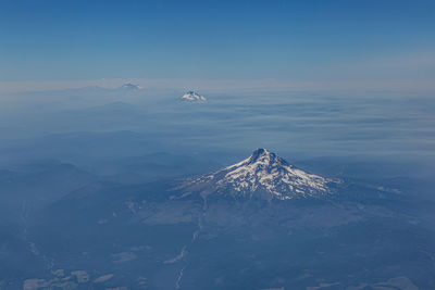 Scenic view of snowcapped mountain against sky