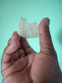 Close-up of person holding hands