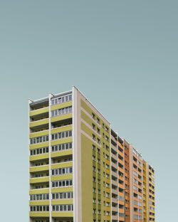 Low angle view of buildings against clear sky