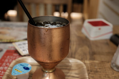 Close-up of beer in glass on table