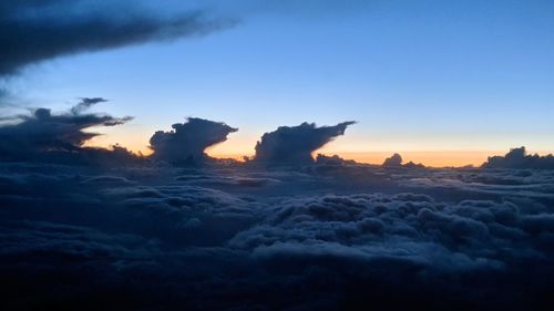 Scenic view of dramatic sky during sunset