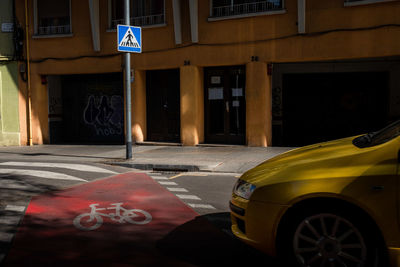 Road sign on street in city