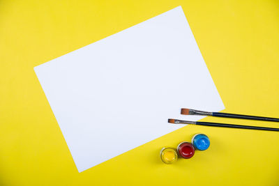 High angle view of multi colored paper on table