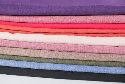 Close-up of multi colored folded towels on table