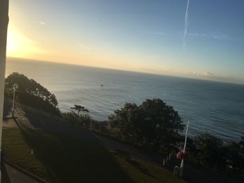 High angle view of sea against cloudy sky