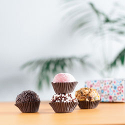 Close-up of cupcakes on table