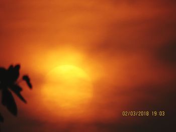 Close-up of orange sky at sunset