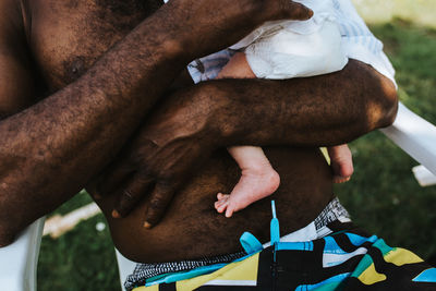 Father with newborn baby