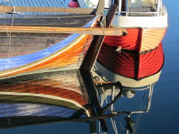 Close-up of boat moored in water