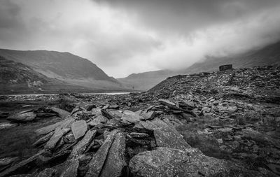 Scenic view of landscape against cloudy sky