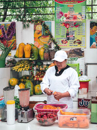 Man standing at market stall