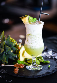 Close-up of drink served on table