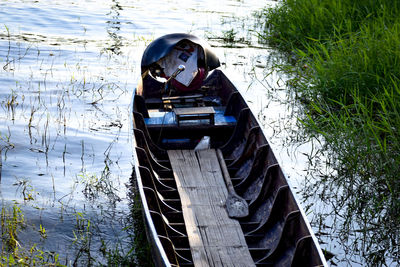 Portrait of man standing by lake