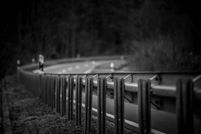 Close-up of metal railing on land