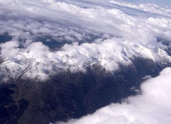 Aerial view of landscape with mountains in background
