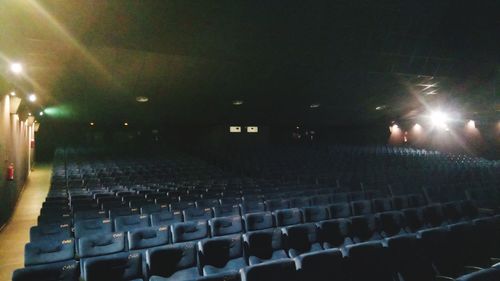 Group of people in stadium at night