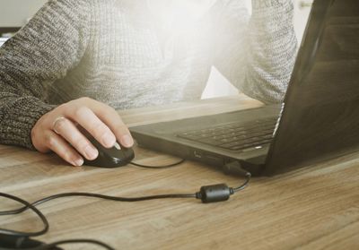 Man using laptop on table