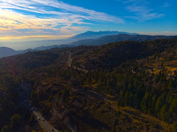 Scenic view of landscape against sky during sunset