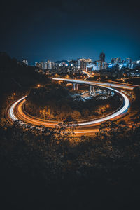 High angle view of cityscape against sky at night