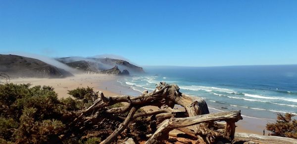 Scenic view of sea with fog