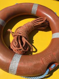 High angle view of rope tied up boat