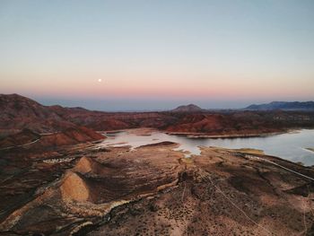 Scenic view of mountains against sky during sunset