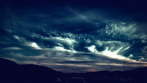 Low angle view of storm clouds at night