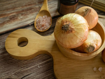 High angle view of fruits on cutting board