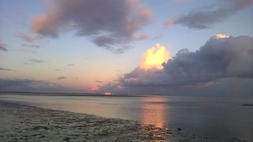 Scenic view of sea against sky during sunset