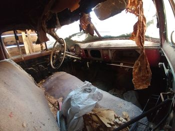 Close-up of abandoned car