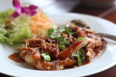 Close-up of meal served in plate on table