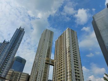 Low angle view of modern buildings against sky