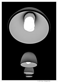 Low angle view of lit lamp
