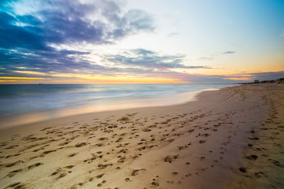 Scenic view of sea at sunset