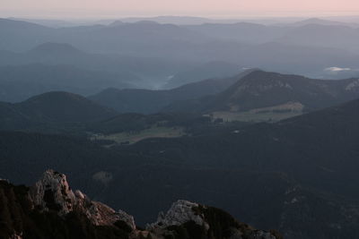Scenic view of mountains against sky during sunset
