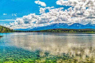 Scenic view of lake against blue sky