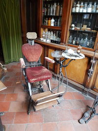 Rear view of man sitting on chair