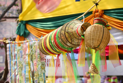Close-up of multi colored hanging for sale at market