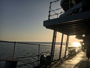 Scenic view of sea against clear sky during sunset