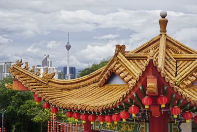 Temple against sky in city