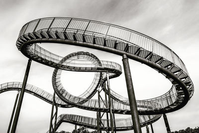 Low angle view of ferris wheel against sky