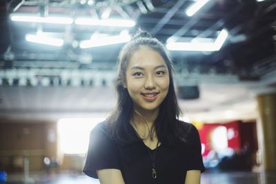 Portrait of smiling young woman