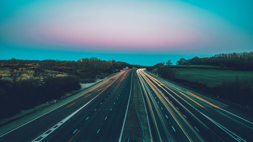 High angle view of light trails on highway